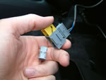 Unplugging the pretensioner connector